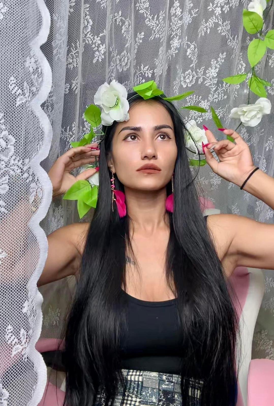 Yupa with a flower in her hair